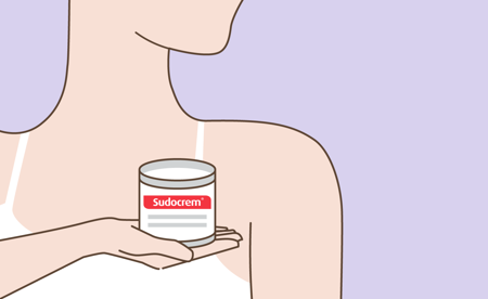 Illustration of a woman holding Sudocrem product  Card image of a woman holding Sudocrem product